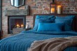 Cozy elegance: Bed with blue pillow and coverlet near fireplace in loft interior design of modern bedroom, featuring rustic charm of brick wall.