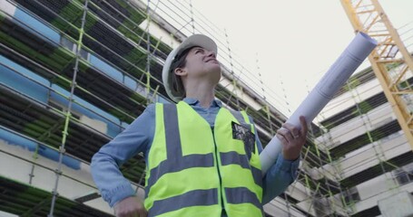 Wall Mural - Happy woman, architect and inspection on construction site for building, industrial architecture or management. Female person, contractor or civil engineer smile with blueprint for safety structure