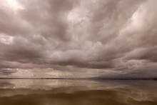 Dramatic Sky Is Reflecting In The Water Surface Of A Lake In Amboseli NP