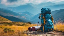 Backpack, Trekking Poles And Sleeping Mat In Mountains, Space For Text. Tourism Equipment
