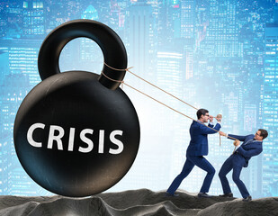 Wall Mural - Businessman in crisis concept pulling kettlebell