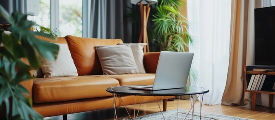 Wall Mural - Contemporary room with chic couch and laptop on table