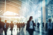 Intentionally blurred image of a tradeshow convention or expo with professionals