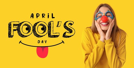 Wall Mural - Banner for April Fools' Day with funny young woman in disguise on yellow background