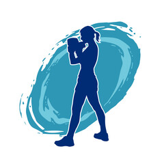 Silhouette of woman boxing athlete in action pose. Silhouette of a female wearing boxing gloves for boxing sport.