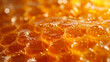 Close-up of golden honey with bubbles highlighting its viscosity and natural sweetness, suitable for food and health concepts