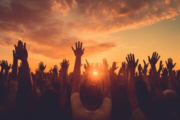 Wall Mural - Group of people raising their hands during sunset