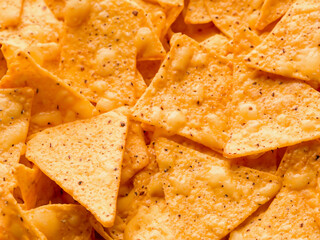 Sticker - closeup of nachos with tortilla chips, copy space background.