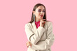 © Pixel-Shot - Stylish young woman on pink background