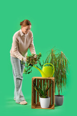 Sticker - Young woman with plants on green background