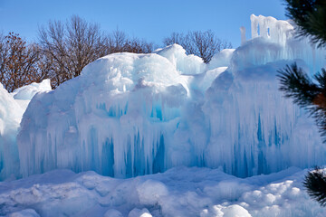 Wall Mural - Ice and snow formed into a magical winter castle on a cold day near Minneapolis Minnesota USA