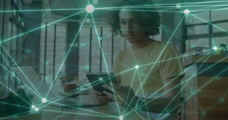 Poster - Image of network of connections over biracial man using tablet