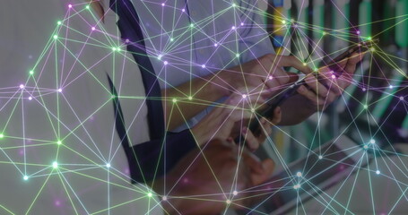 Poster - Image of data and network of connections over diverse businesspeople using tablets