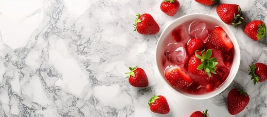 Wall Mural - White marble with fresh strawberries and gelatin dessert.