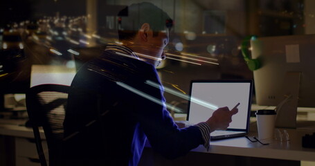 Poster - Image of asian businessman using computer over data processing and cityscape
