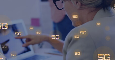 Poster - Image of 5g texts over caucasian woman using laptop