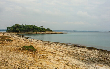 Wall Mural - The rugged limestone coast of Kamenjak National Park on the Premantura peninsula of Medulin, Istria, Croatia. December