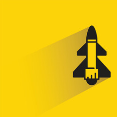 Wall Mural - missile and rocket icon with shadow on yellow background