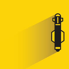 Wall Mural - missile icon with shadow on yellow background