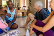 © Wavebreak Media - Happy diverse seniors resting in pilates class