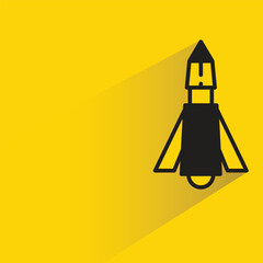 Sticker - missile and rocket icon with shadow on yellow background