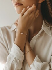 Wall Mural - Close-up of a woman adorned with delicate jewelry, evoking subtle elegance