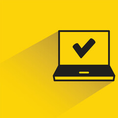 Canvas Print - laptop and check mark icon with shadow on yellow background