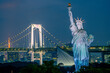 Odaiba Nightlights: Statue of Liberty and Rainbow Bridge Illuminated in Tokyo Bay