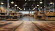 © Muzikitooo - The backdrop of this product display montage is a blurred warehouse, with an empty wooden table as the centerpiece