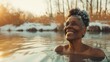 Smiling middle-aged black woman in a winter cold pond