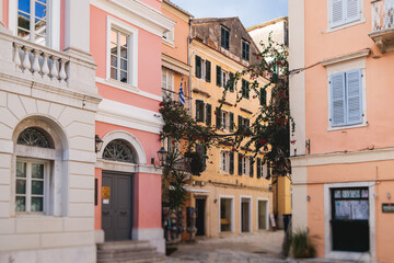 Corfu street view, Kerkyra old town beautiful cityscape, Ionian sea Islands, Greece, a summer sunny day, pedestrian streets with shops and cafes, architecture of historic center, travel to Greece