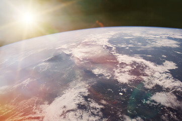 Wall Mural - view of earth planet in outer space with sunlight. elements of this image furnished by nasa.