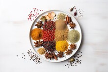 A Bowl Of Spices On A White Background With Space To Write
