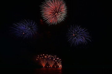 colourful firework display set for celebration happy new year and merry christmas and  fireworks on black background