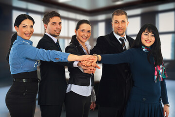 Group of casually dressed people looking at the camera