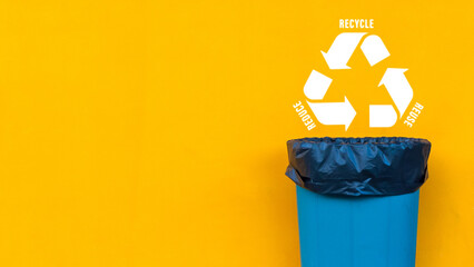 Wall Mural - Reduce, reuse, recycle symbol with garbage bin on yellow background, Ecological concept, ecological metaphor for ecological waste management and sustainable and economical lifestyle.