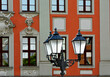 Historyczne latarnie miejskie, latarnia uliczna w starym stylu, Historic lanterns against the background of the city buildings in the sunlight, lantern in the city, Old style lantern street light 
