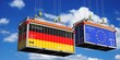 © PX Media - Shipping containers with flags of Germany and European Union - 3D illustration