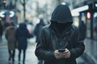 Hacker or scammer Stand amongst passers-by eavesdropping on information with your phone