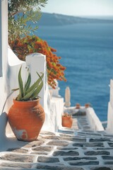 Poster - A potted plant sitting on a wall by the water. Perfect for adding a touch of nature to any space