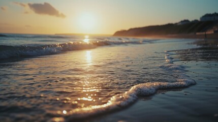 Poster - A beautiful sunset over the water on the beach. Perfect for travel and vacation themes