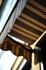 Poster - A detailed view of a canopy on a building. Perfect for architectural designs and urban landscapes
