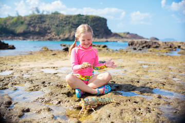 Wall Mural - Child snorkeling. Kids underwater. Beach and sea.