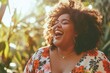 Excited plus size woman laughing and having fun feeling positive emotions