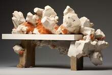 Ceramic Figurines Of Lions On A Wooden Bench