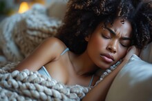 A Fashion-forward Lady With Black Ringlet Hair And A Jheri Curl Lies Peacefully On A Couch, Her Eyes Closed And Skin Glowing, Adorned With Fashionable Accessories For A Stunning Photo Shoot