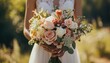 wedding bouquet in the hands of bride