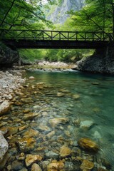 Aufkleber - A picturesque bridge spanning a river, surrounded by lush green trees. Perfect for nature lovers and landscape enthusiasts