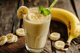 Fototapeta Do pokoju - Smoothie with banana and mint on white wooden table Clean eating alkaline diet 