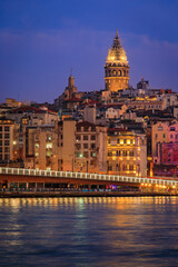 Canvas Print - Sunrise cityscape of the Karakoy area across the Bosphorus Strait near Galata Bridge with the Galata Tower at the blue hour in Istanbul, Turkey